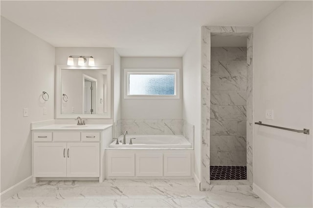 bathroom featuring vanity and independent shower and bath