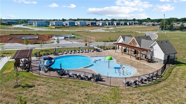 view of swimming pool with a pergola and a patio