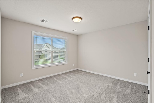 empty room featuring carpet