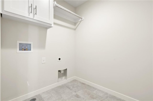 laundry room with hookup for an electric dryer, cabinets, and hookup for a washing machine