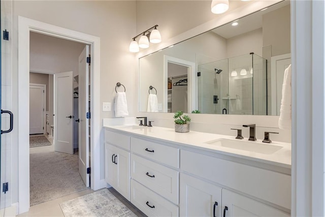 bathroom featuring vanity and walk in shower