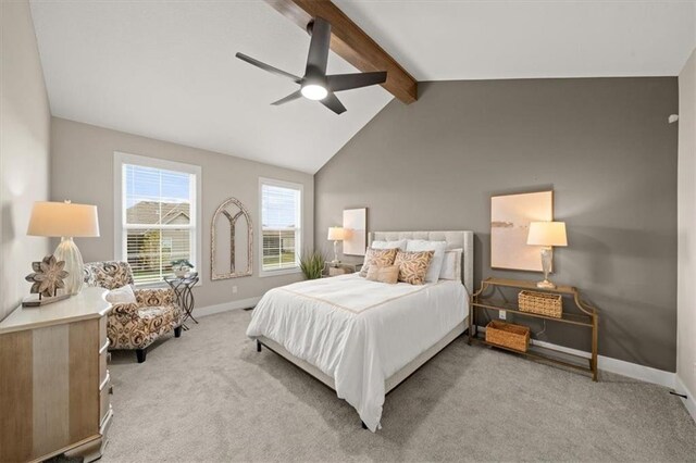 carpeted bedroom featuring vaulted ceiling with beams and ceiling fan