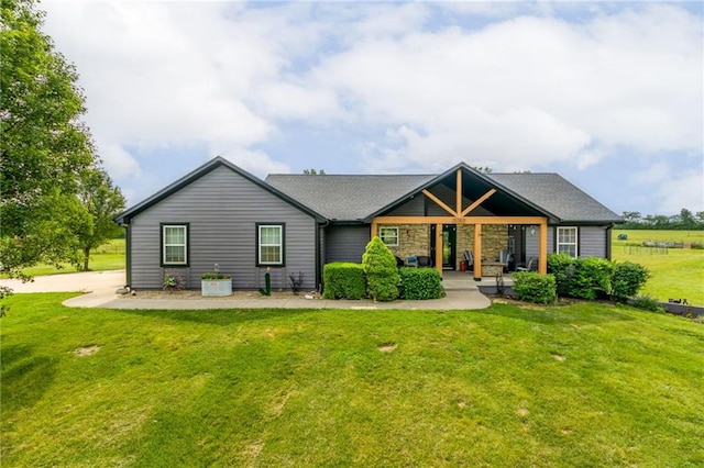 view of front of property with a front lawn