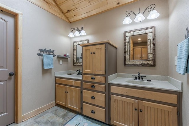 bathroom with vanity, wooden ceiling, and lofted ceiling