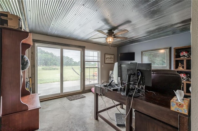 office area featuring ceiling fan and concrete floors