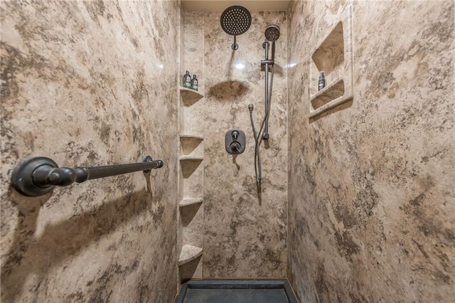 bathroom with a tile shower