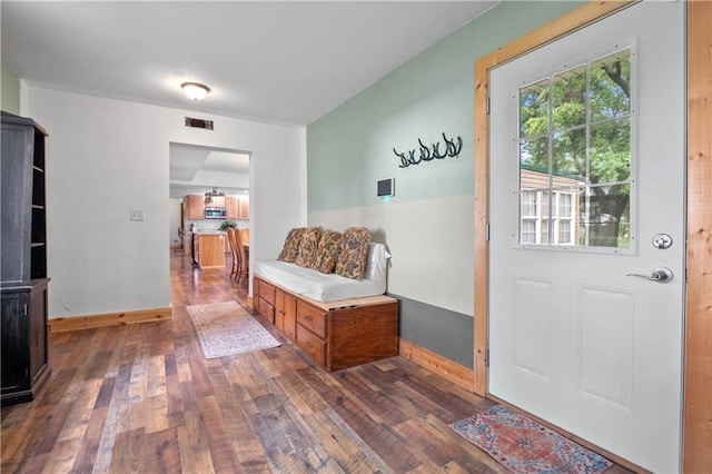 interior space with dark hardwood / wood-style flooring