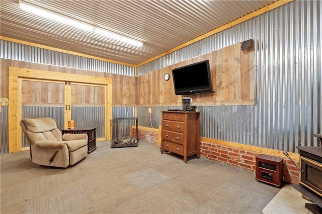 living area featuring carpet flooring