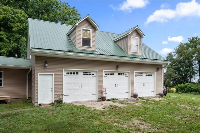 garage with a yard