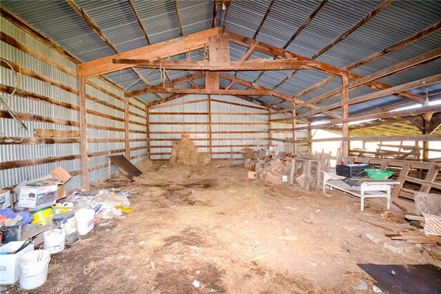 miscellaneous room with lofted ceiling