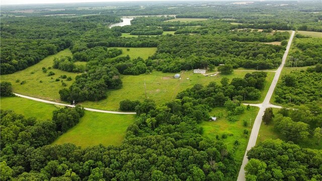 birds eye view of property featuring a rural view