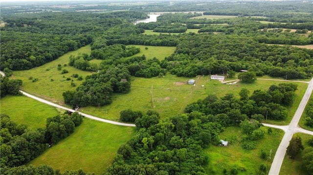 birds eye view of property featuring a rural view