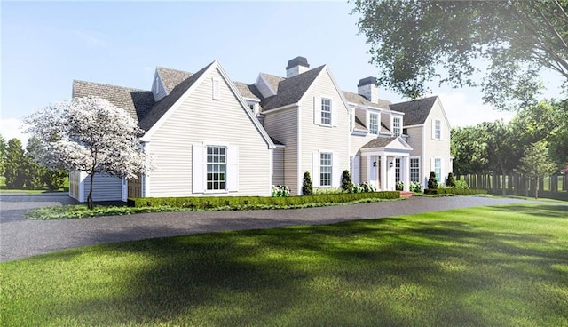 view of front of home featuring a front lawn