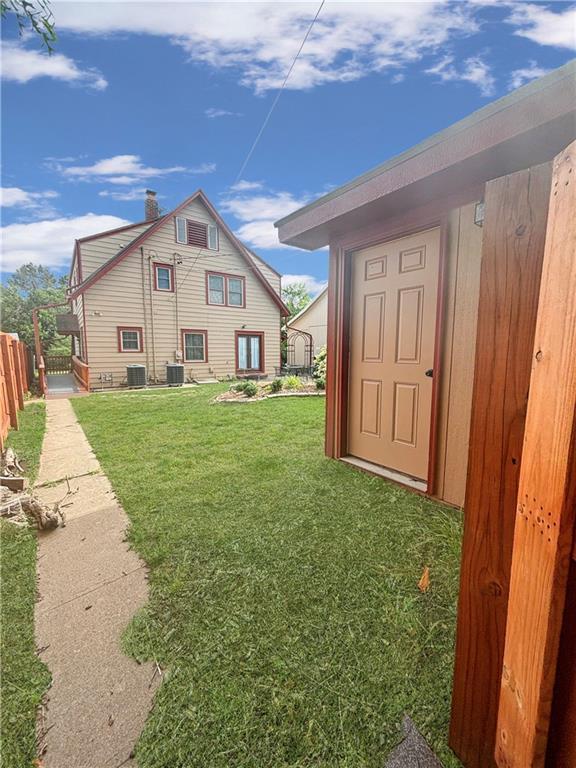 view of yard with central AC unit