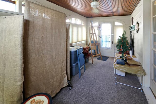 sunroom with wood ceiling