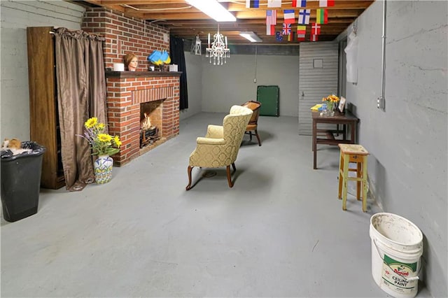 interior space with concrete flooring and a brick fireplace