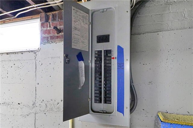 utility room featuring electric panel