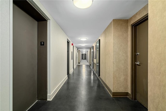 corridor featuring elevator