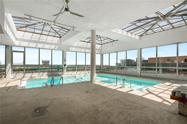 view of pool with ceiling fan