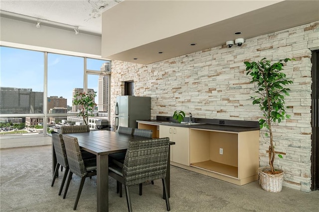 dining space featuring sink