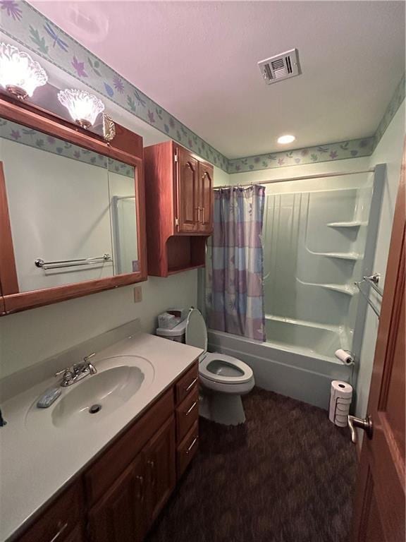 full bathroom featuring shower / bath combo, toilet, and vanity