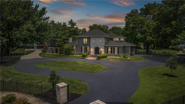 view of front of home featuring a yard