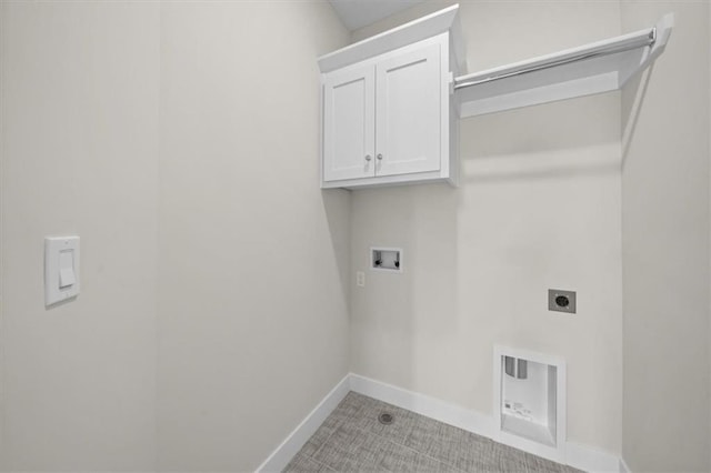 laundry room with hookup for an electric dryer, cabinets, and hookup for a washing machine