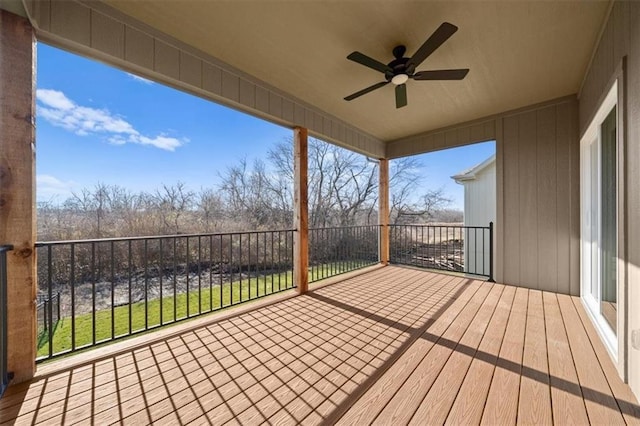 wooden deck with ceiling fan