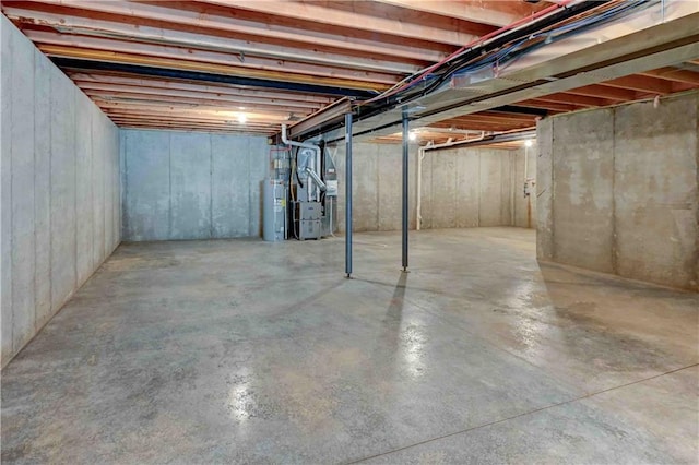 basement featuring electric water heater