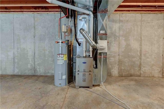 utility room featuring electric water heater