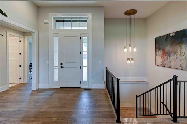 entrance foyer featuring wood-type flooring