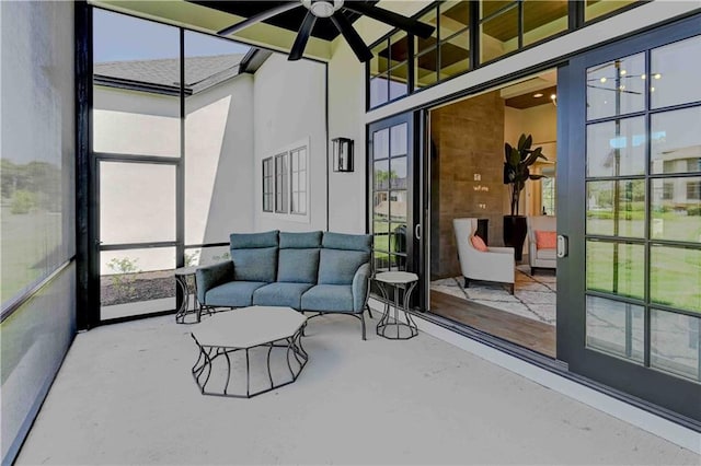 sunroom / solarium with ceiling fan