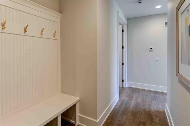 mudroom with dark hardwood / wood-style flooring