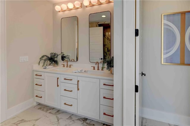 bathroom with tile patterned floors and double sink vanity