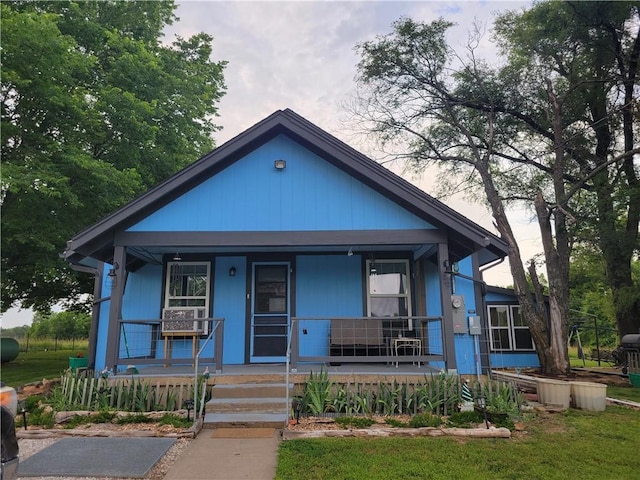 bungalow-style home with a porch