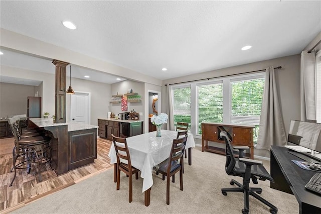 dining space featuring light hardwood / wood-style flooring