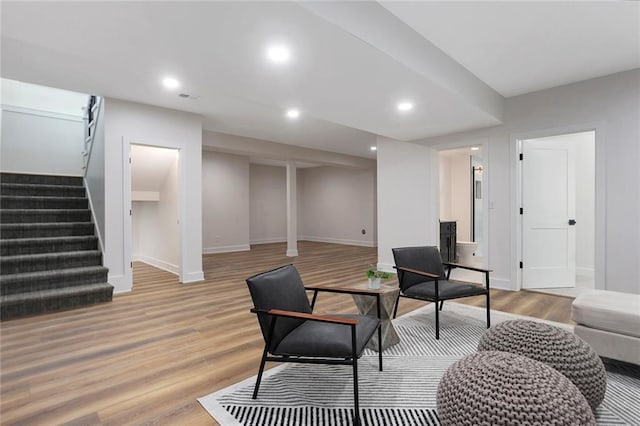 sitting room featuring light hardwood / wood-style flooring