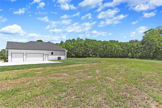 view of yard with a garage