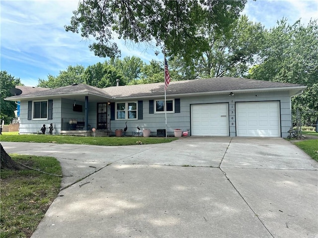 ranch-style house featuring a garage