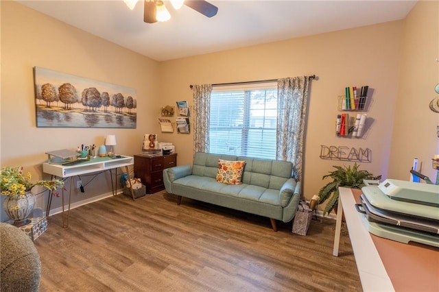 interior space with ceiling fan and hardwood / wood-style flooring