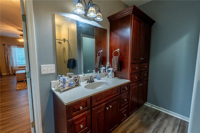 bathroom featuring vanity and hardwood / wood-style floors