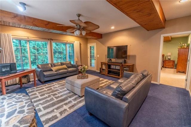 carpeted living room featuring a healthy amount of sunlight and ceiling fan