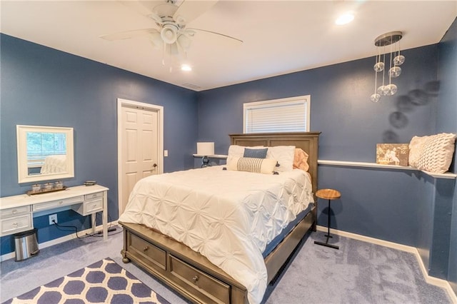 carpeted bedroom with ceiling fan