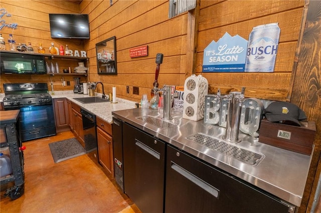 bar with wooden walls, sink, and black appliances