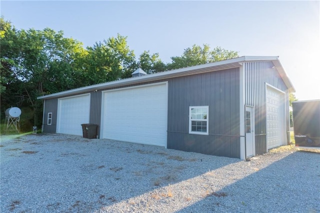 garage with wood walls