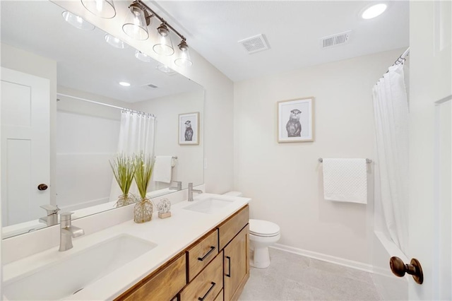 full bathroom featuring vanity, toilet, and shower / bathtub combination with curtain