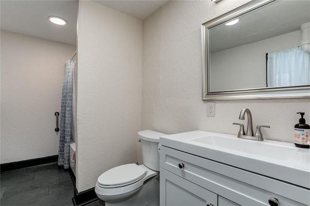 full bathroom with tile patterned floors, vanity, toilet, and shower / tub combo