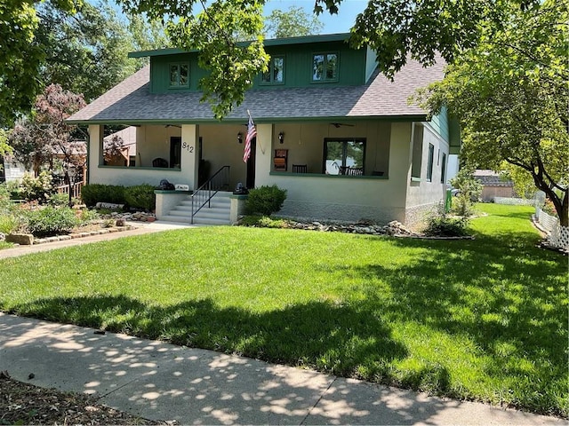 view of front of house featuring a front lawn and a porch