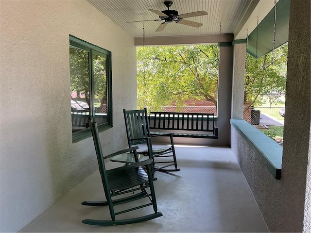 view of patio / terrace featuring ceiling fan