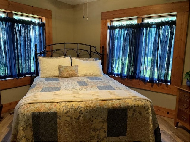 bedroom featuring hardwood / wood-style flooring